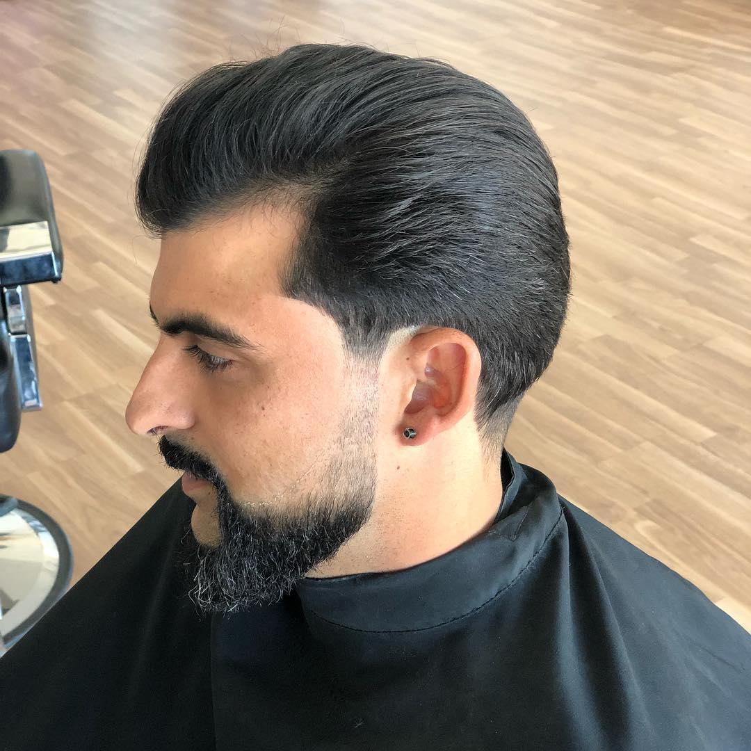 Peinado clásico masculino con barba arreglada en Ofis Barber Vélez-Málaga