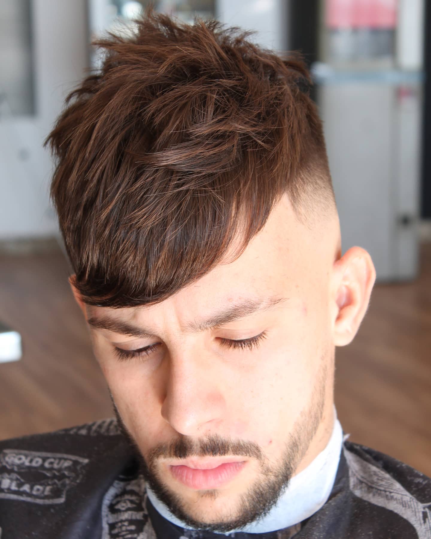 Corte degradado clásico con acabado natural en Ofis Barber Vélez-Málaga